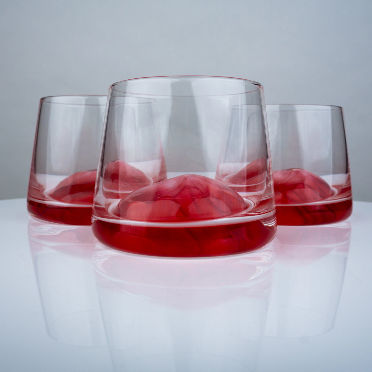 Whiskey aerating glasses with red base modern barware