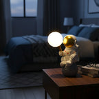 Moon Buddy lamp on nightstand bedroom scene