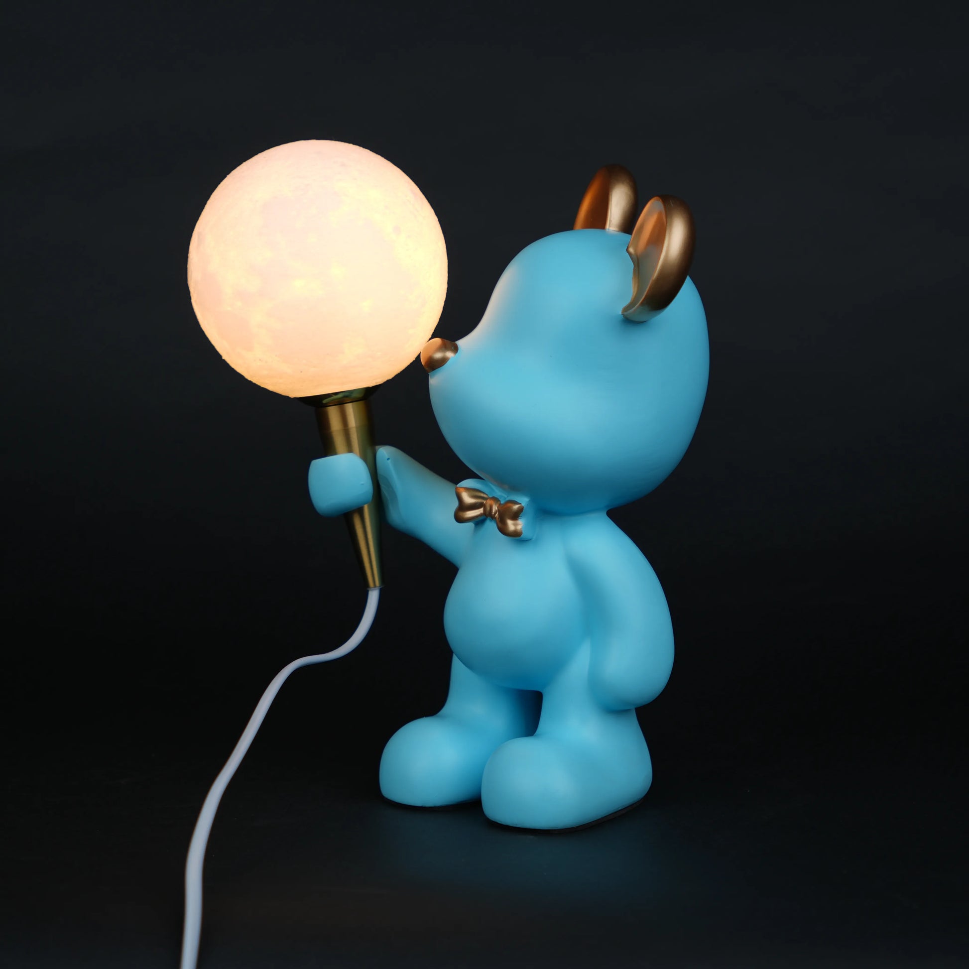 blue bear lamp holding glowing moon bulb with gold accents