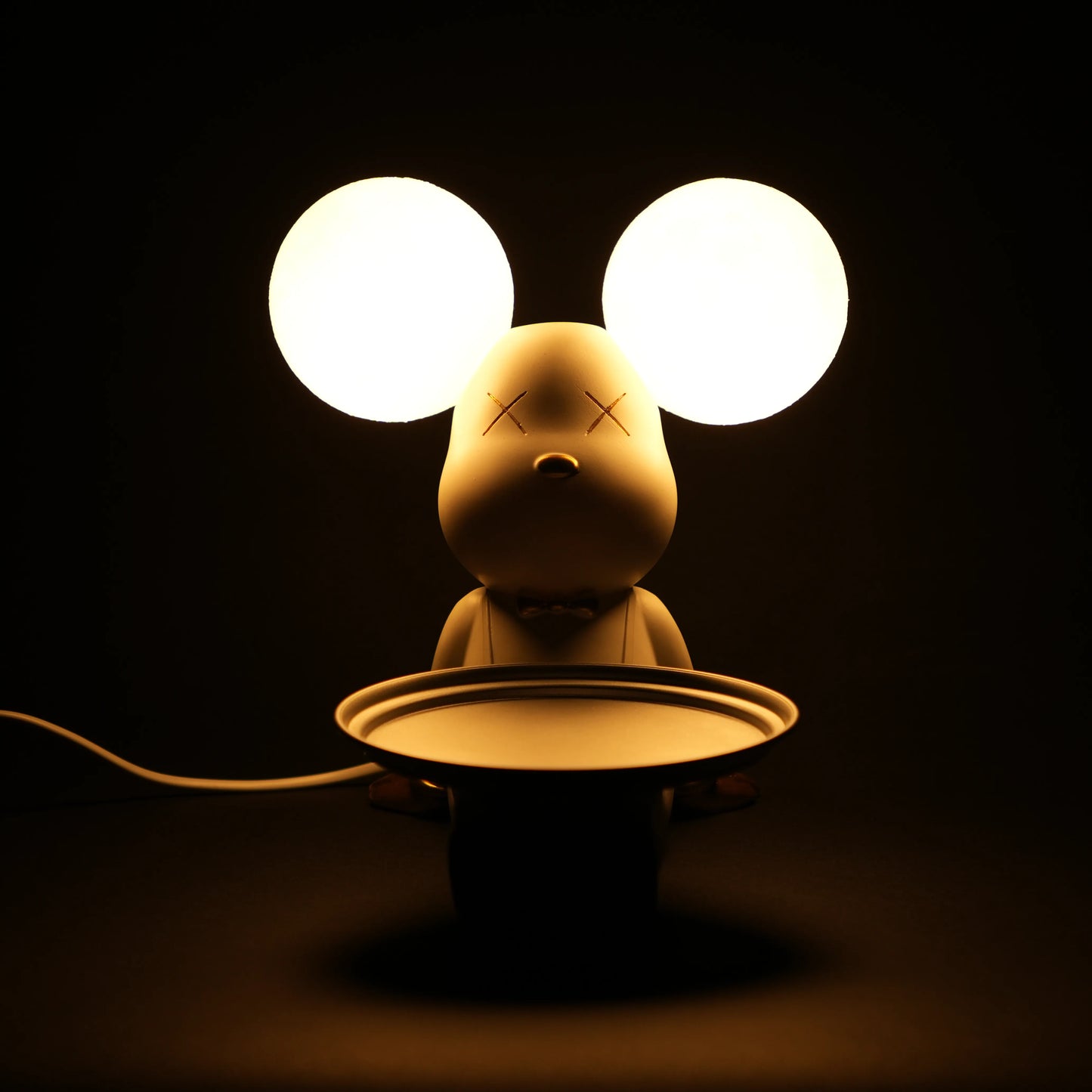 white bunny lamp with glowing round ears and gold-detailed tray
