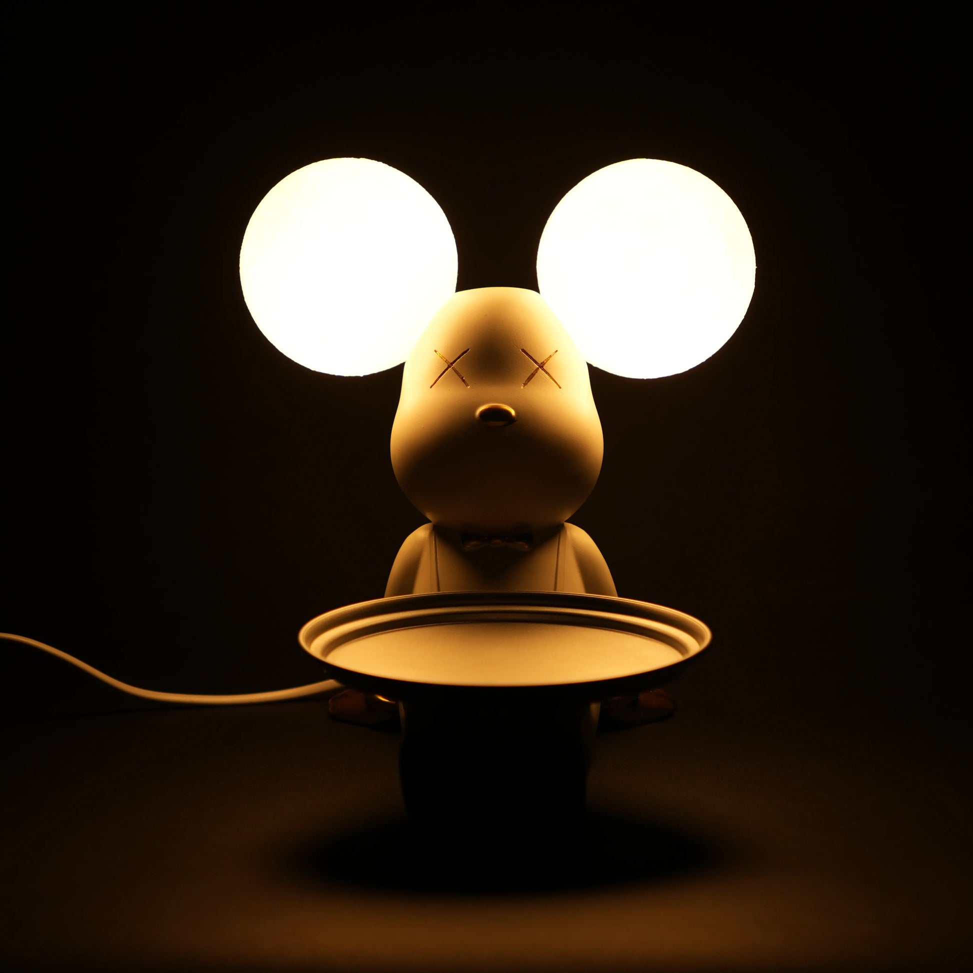 white bunny lamp with glowing round ears and gold-detailed tray