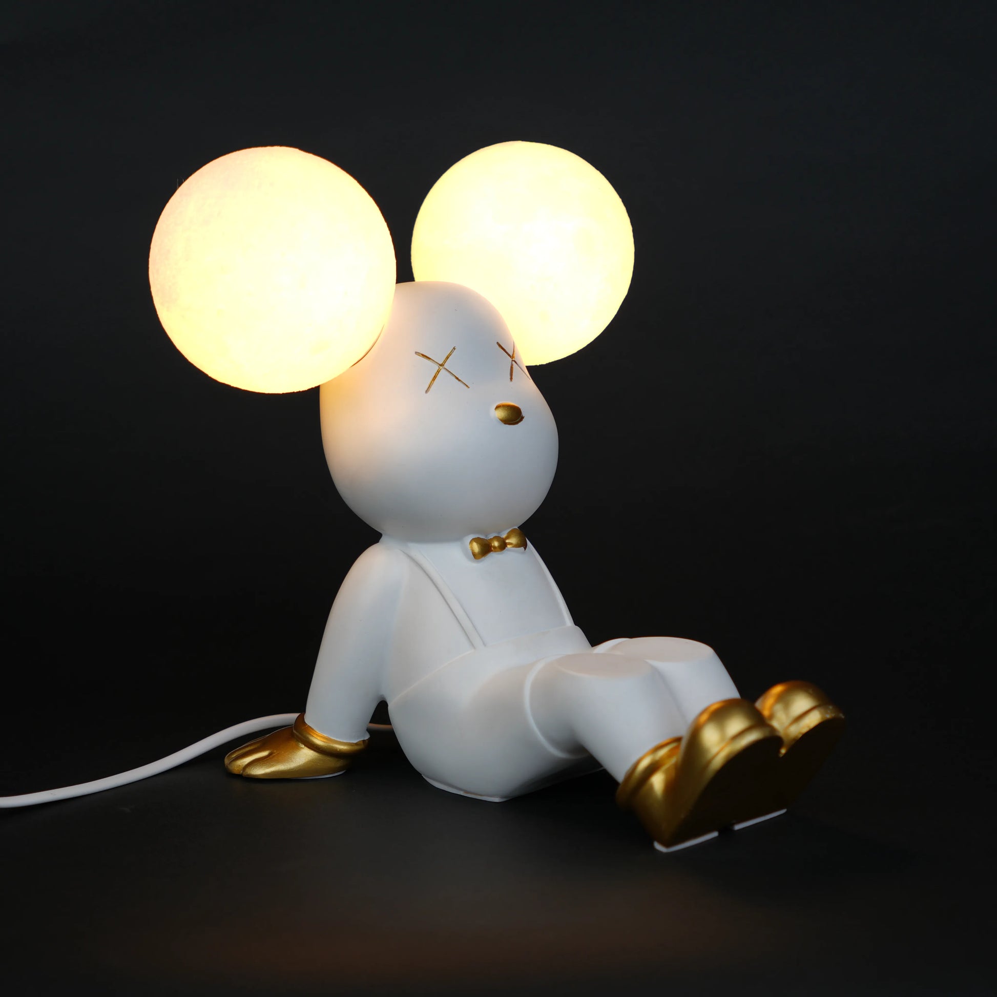 white bunny lamp with glowing round ears and gold-detailed tray