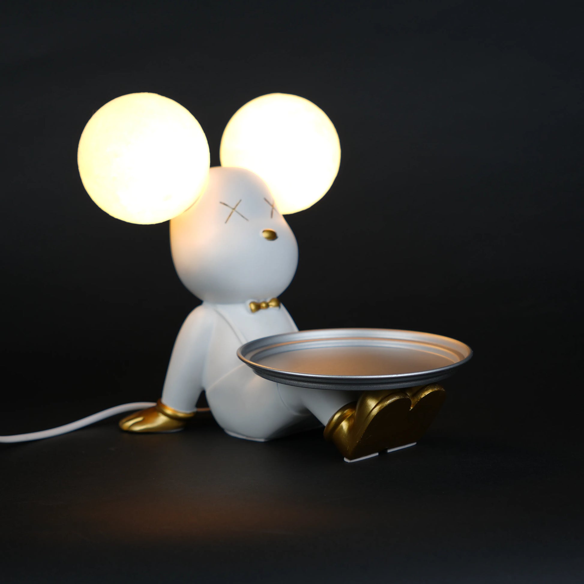 white bunny lamp with glowing round ears and gold-detailed tray