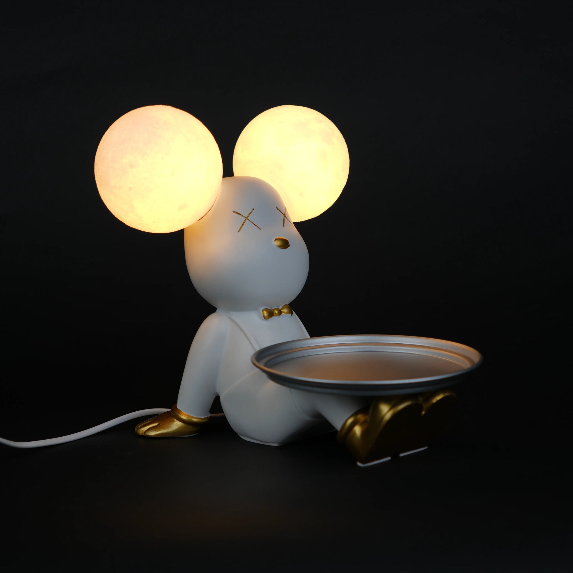 white bunny lamp with glowing round ears and gold-detailed tray