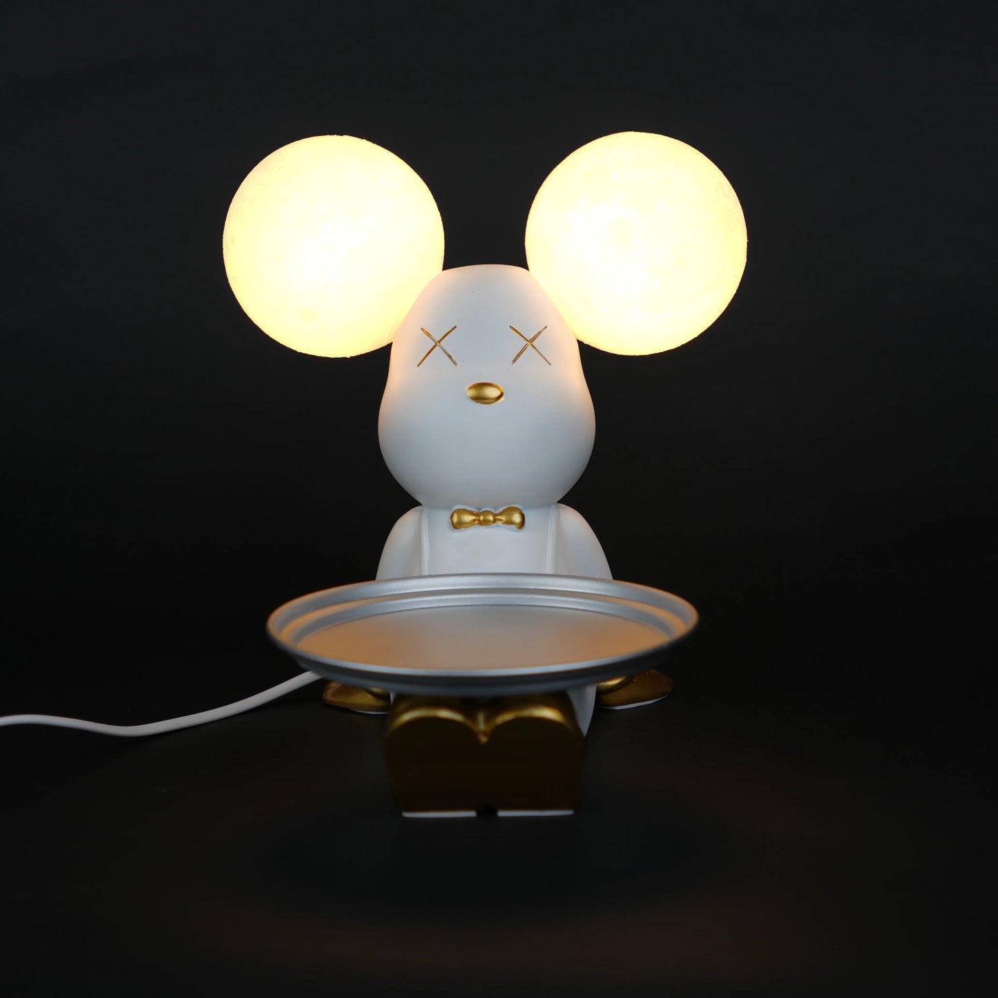 white bunny lamp with glowing round ears and gold-detailed tray
