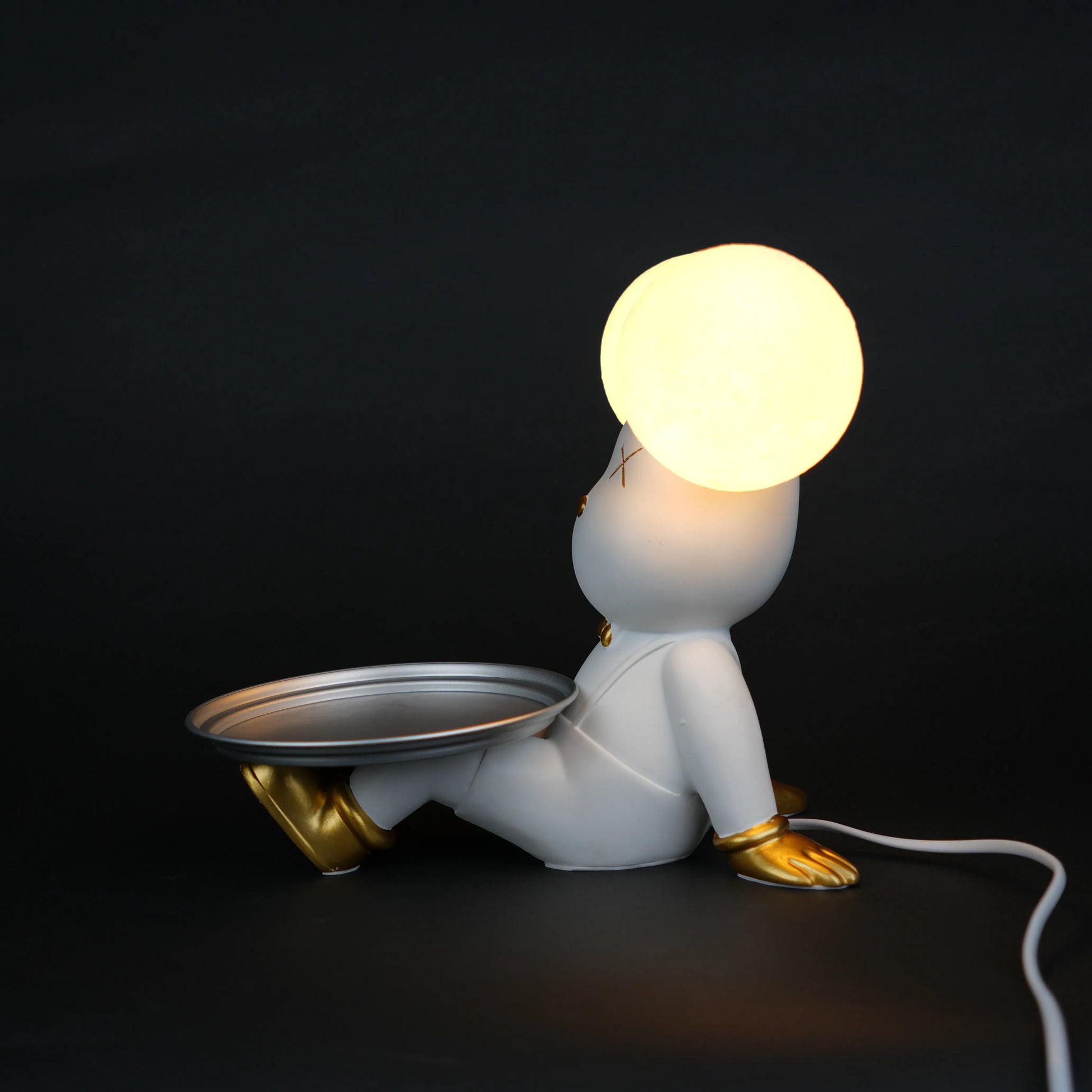white bunny lamp with glowing round ears and gold-detailed tray