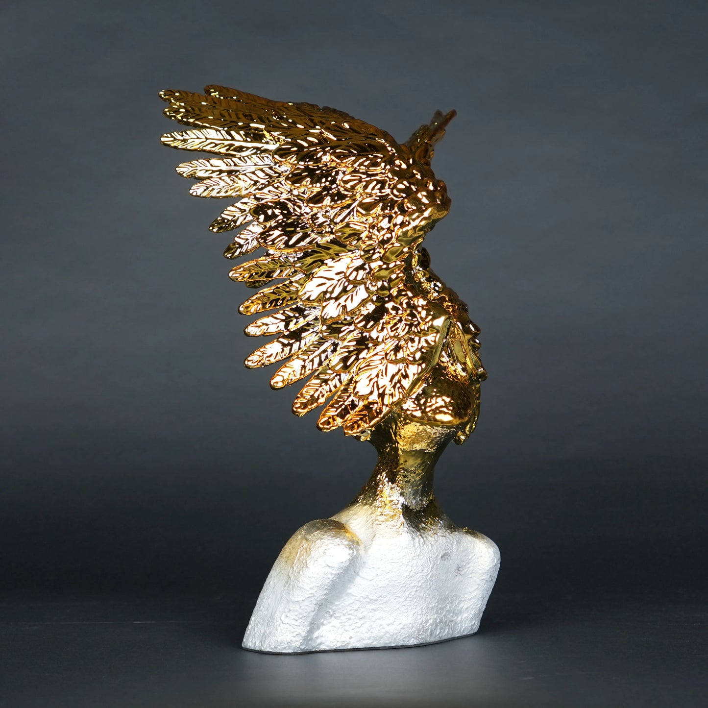 Electroplated gold phoenix wing sculpture with textured silver base – luxury modern décor.