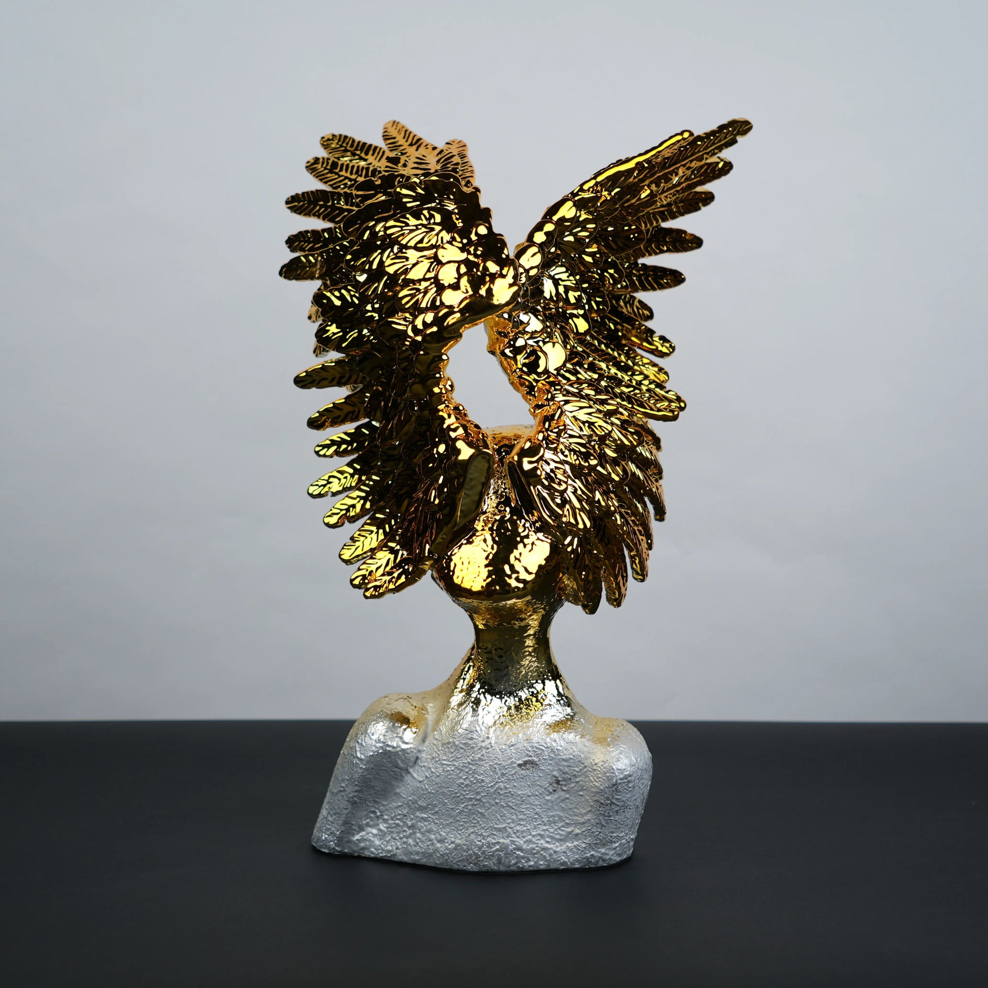 Electroplated gold phoenix wing sculpture with textured silver base – luxury modern décor.