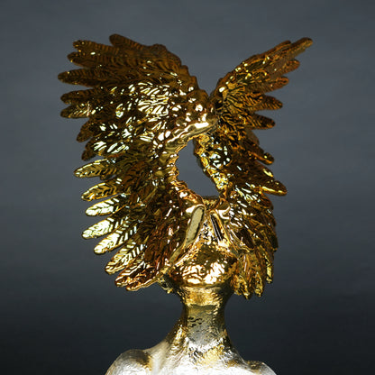 Electroplated gold phoenix wing sculpture with textured silver base – luxury modern décor.