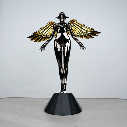 Celestial Chrome Angel Sculpture with reflective chrome body and gold wings on pedestal