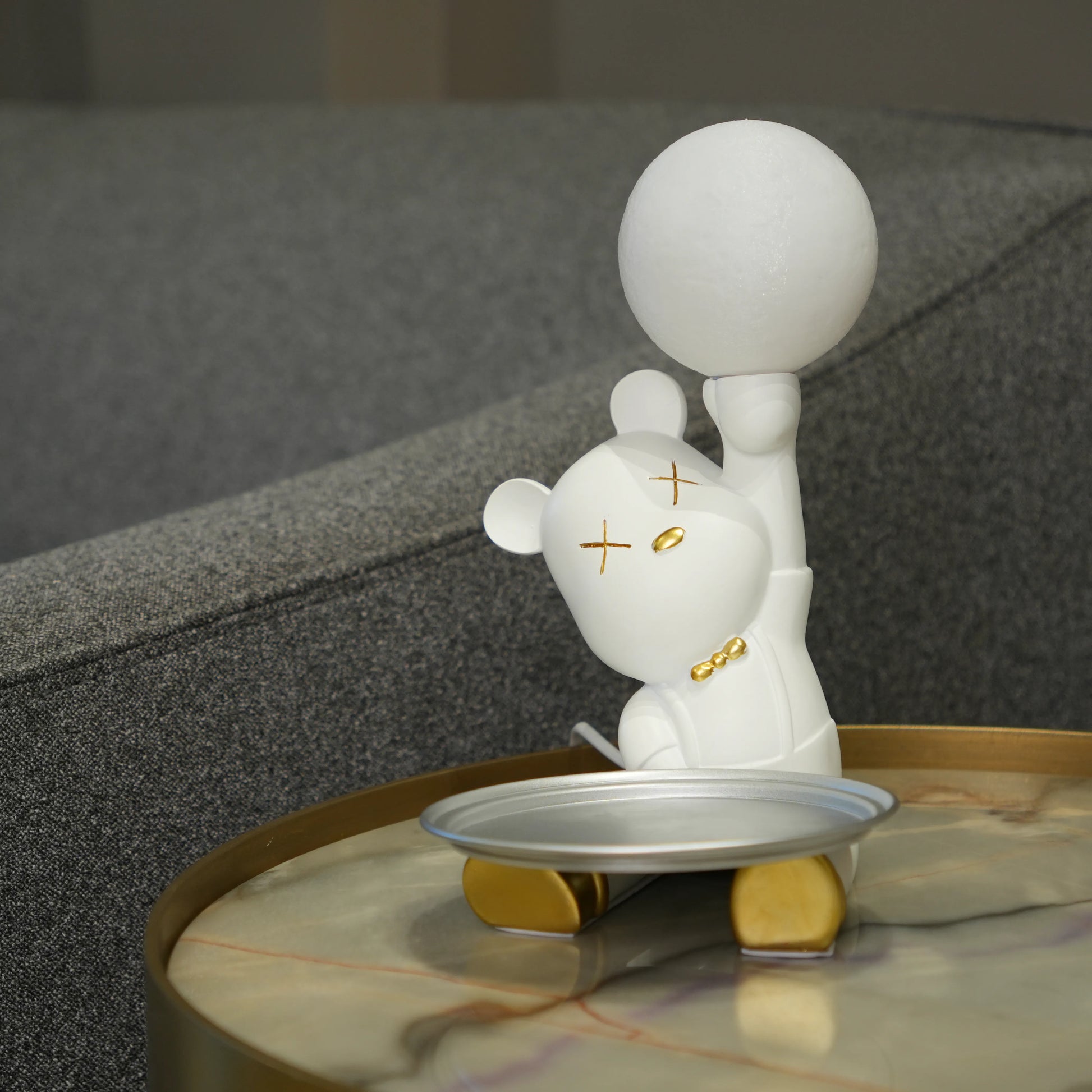 White bunny lamp with glowing orb ears holding a metallic tray.