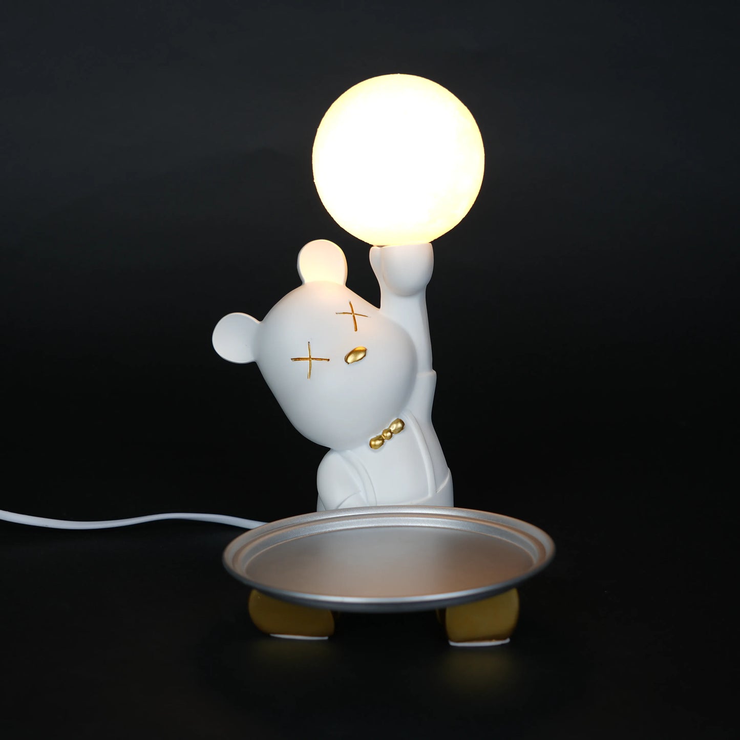 White bunny lamp with glowing orb ears holding a metallic tray.