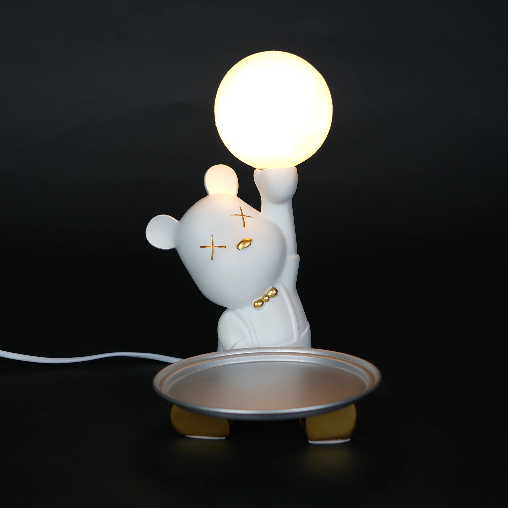 White bunny lamp with glowing orb ears holding a metallic tray.