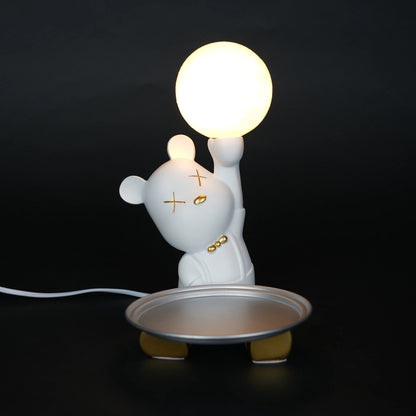 White bunny lamp with glowing orb ears holding a metallic tray.
