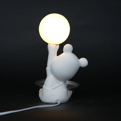 White bunny lamp with glowing orb ears holding a metallic tray.