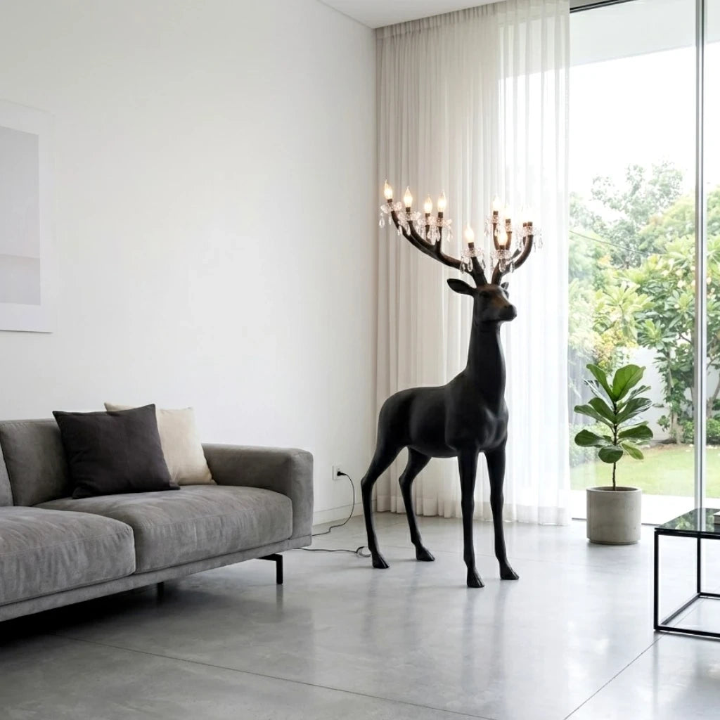 Black reindeer glow lamp w/ grey sofa scene