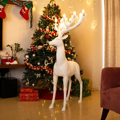 White reindeer sculpture lamp with glowing antlers