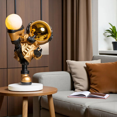 Gold Astronaut Kicker Lamp