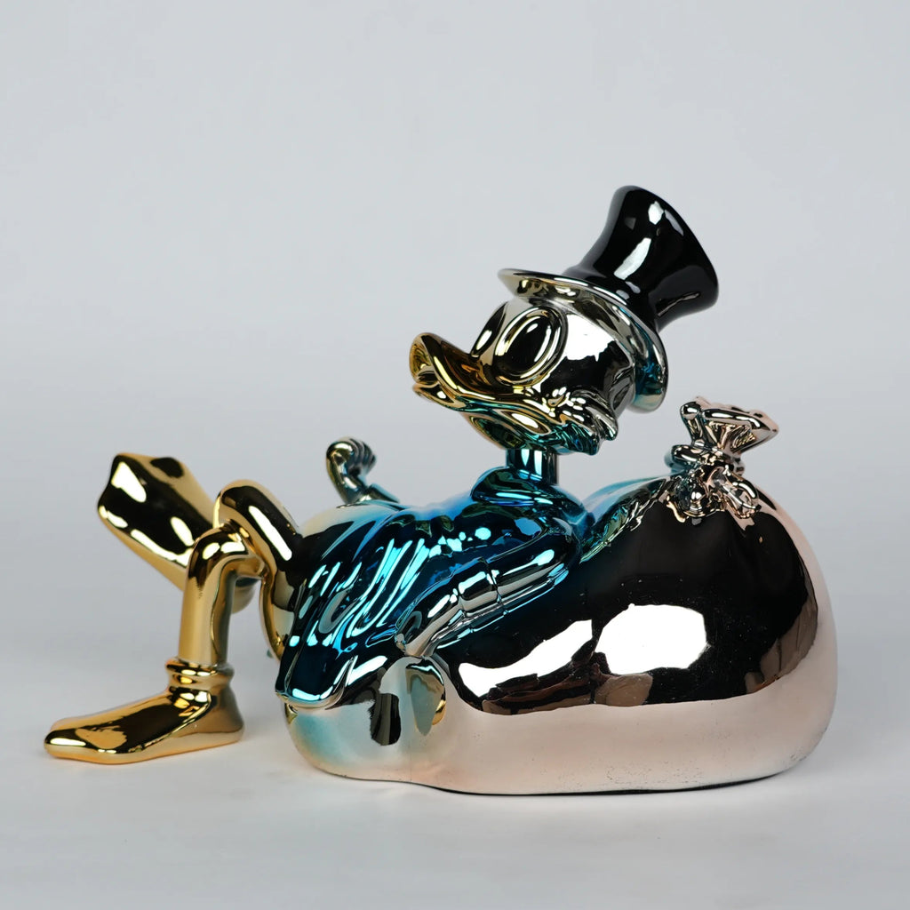 blue chrome pop art figurine with cartoon style decor for modern home styling