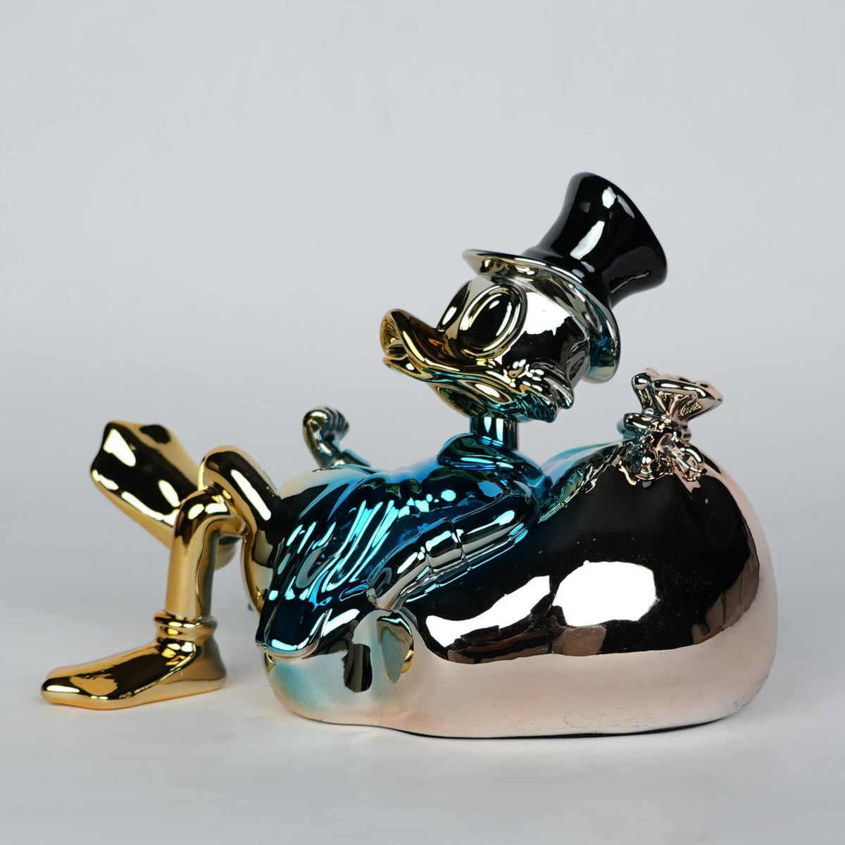 blue chrome pop art figurine with cartoon style decor for modern home styling