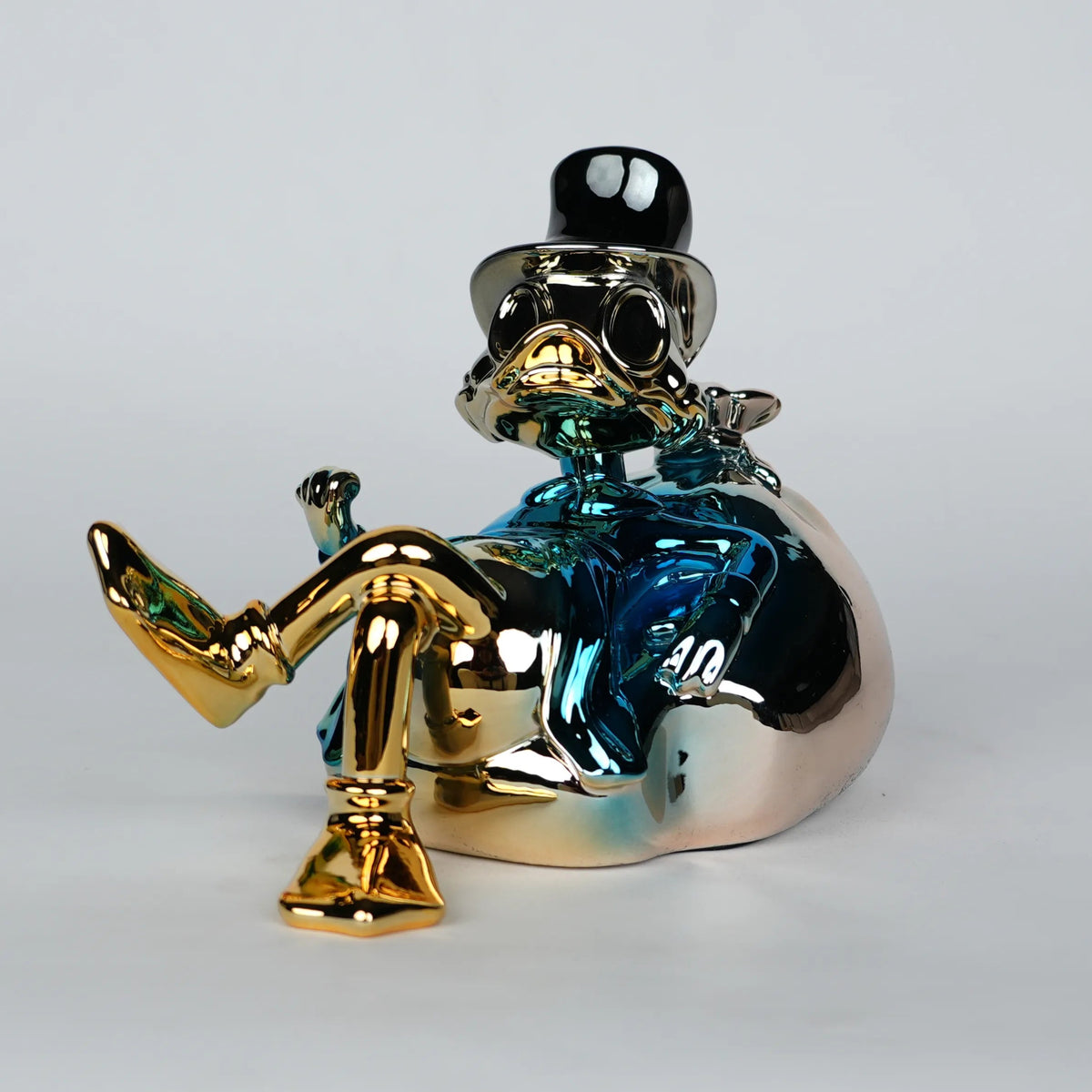 blue chrome pop art figurine with cartoon style decor for modern home styling