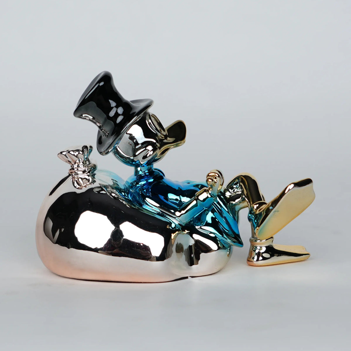 Chrome Tycoon rose-gold teal small figurine