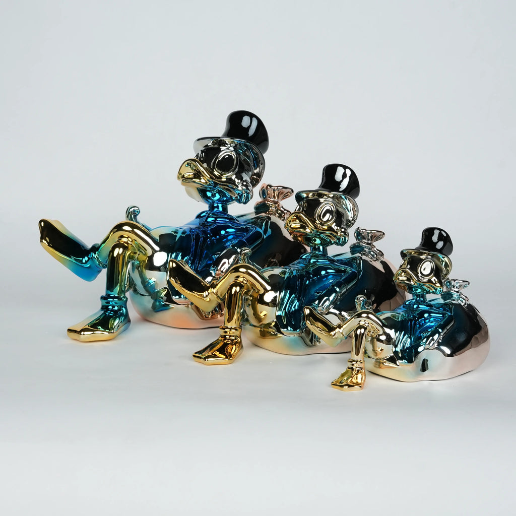 abstract character sculpture with blue chrome finish for luxury home decor