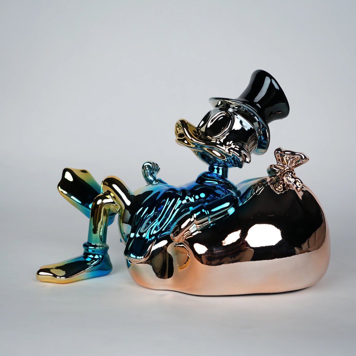 abstract character sculpture with blue chrome finish for luxury home decor