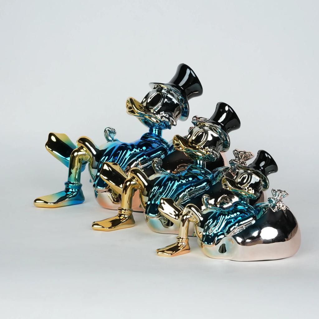 modern chrome figurine sculpture with blue finish for home decor interiors