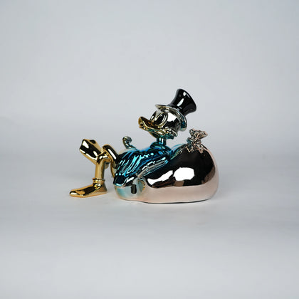 blue chrome pop art figurine with cartoon style decor for modern home styling
