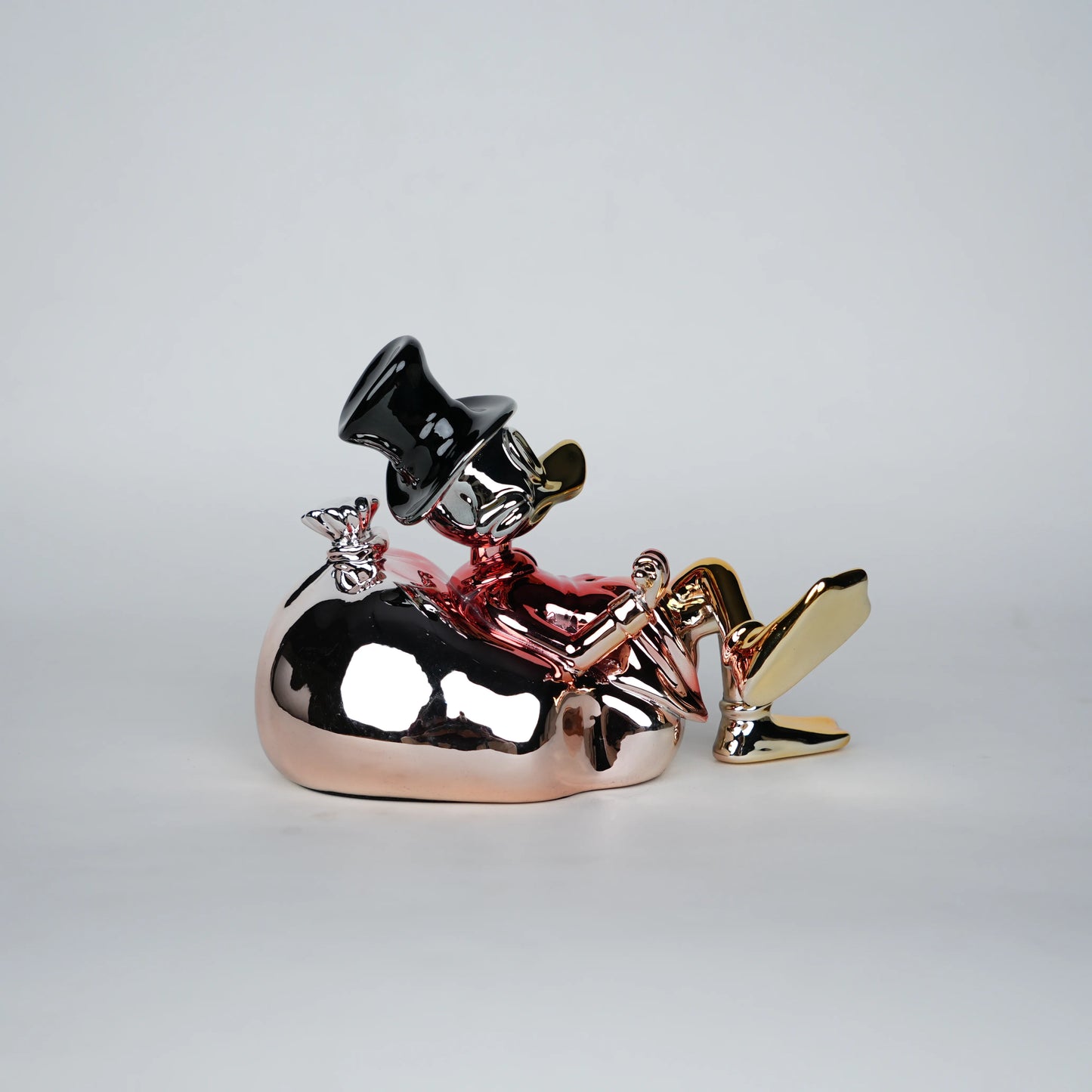 Chrome Money Tycoon gold sculpture