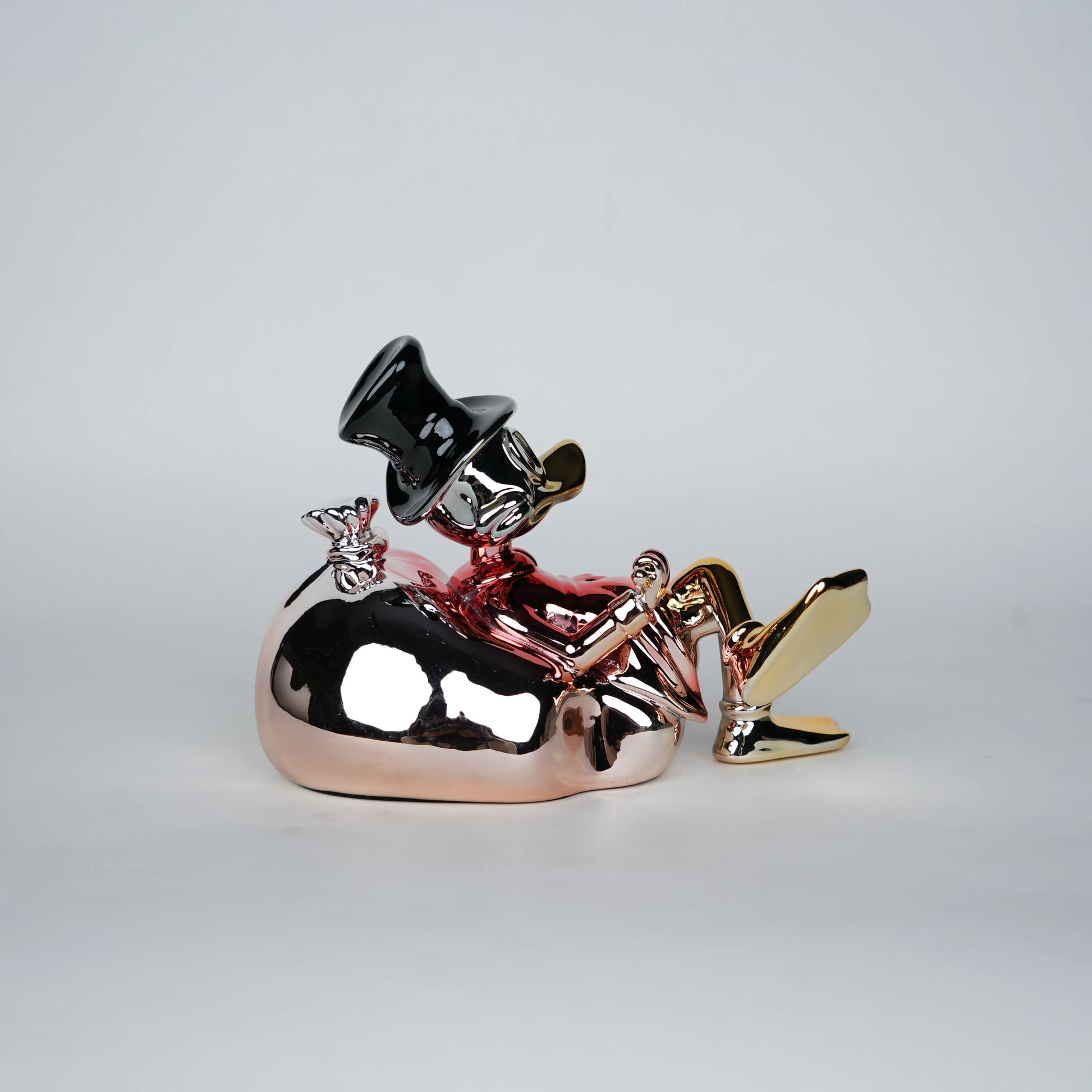 Chrome Money Tycoon gold sculpture