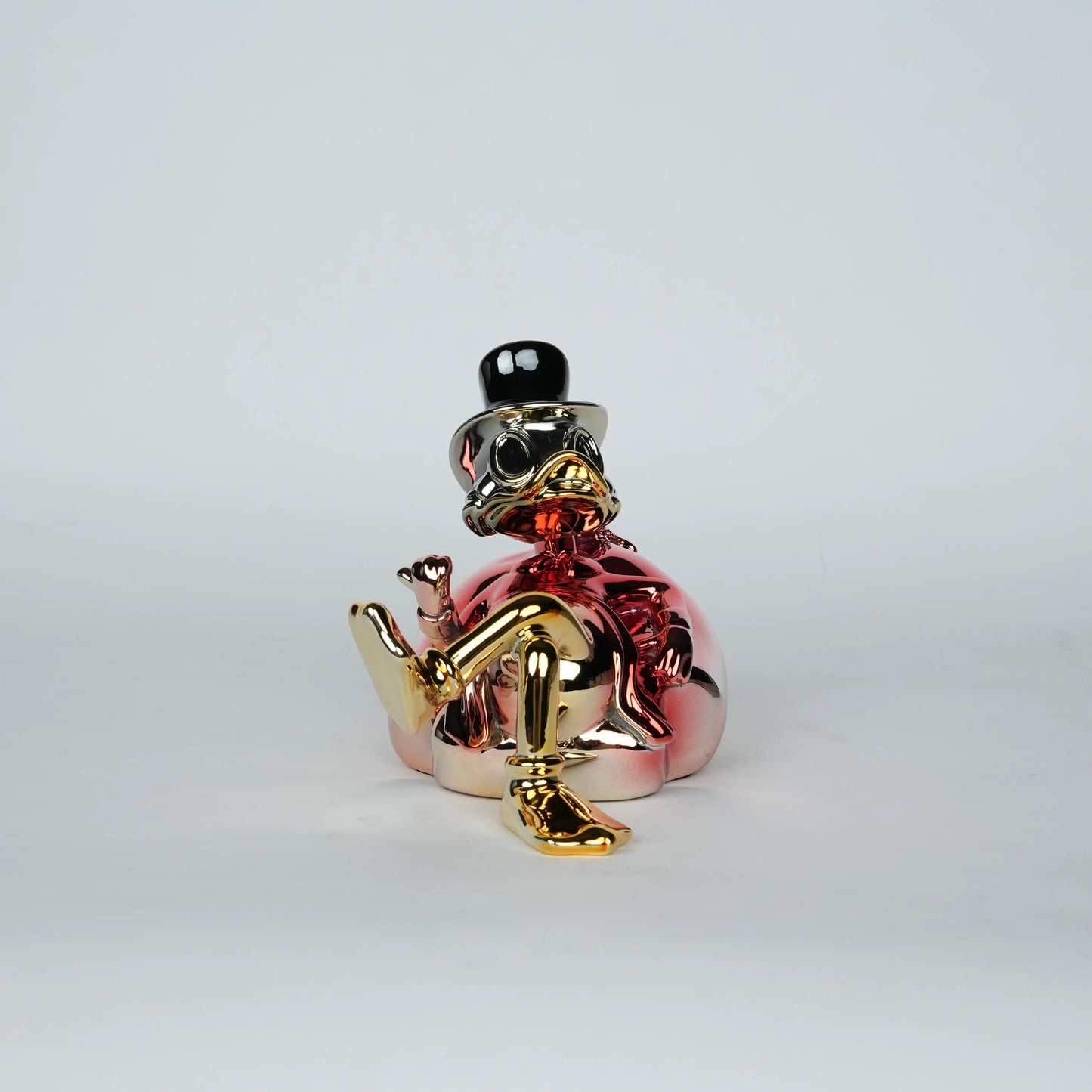 Chrome Money Tycoon gold sculpture