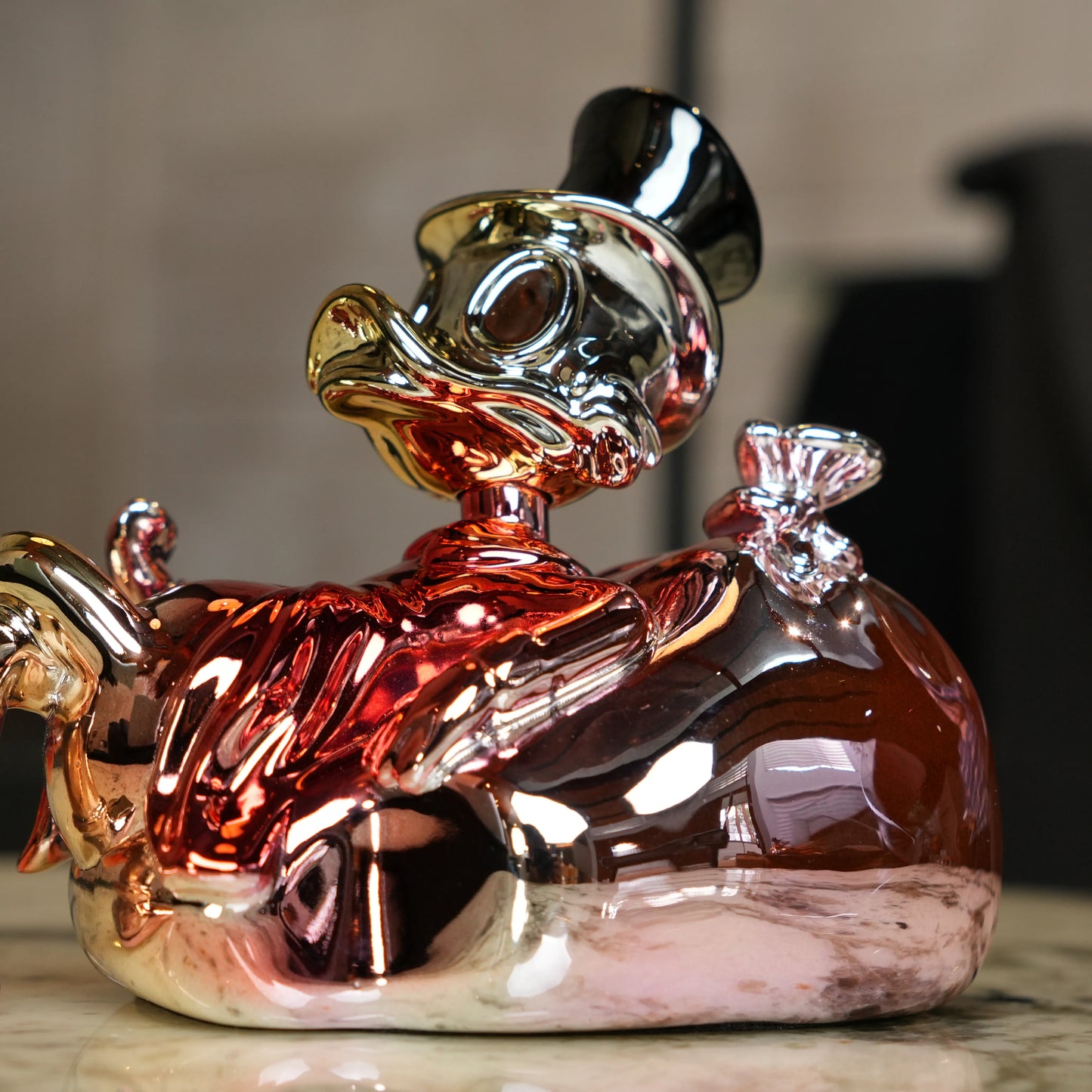 Chrome Money Tycoon gold sculpture