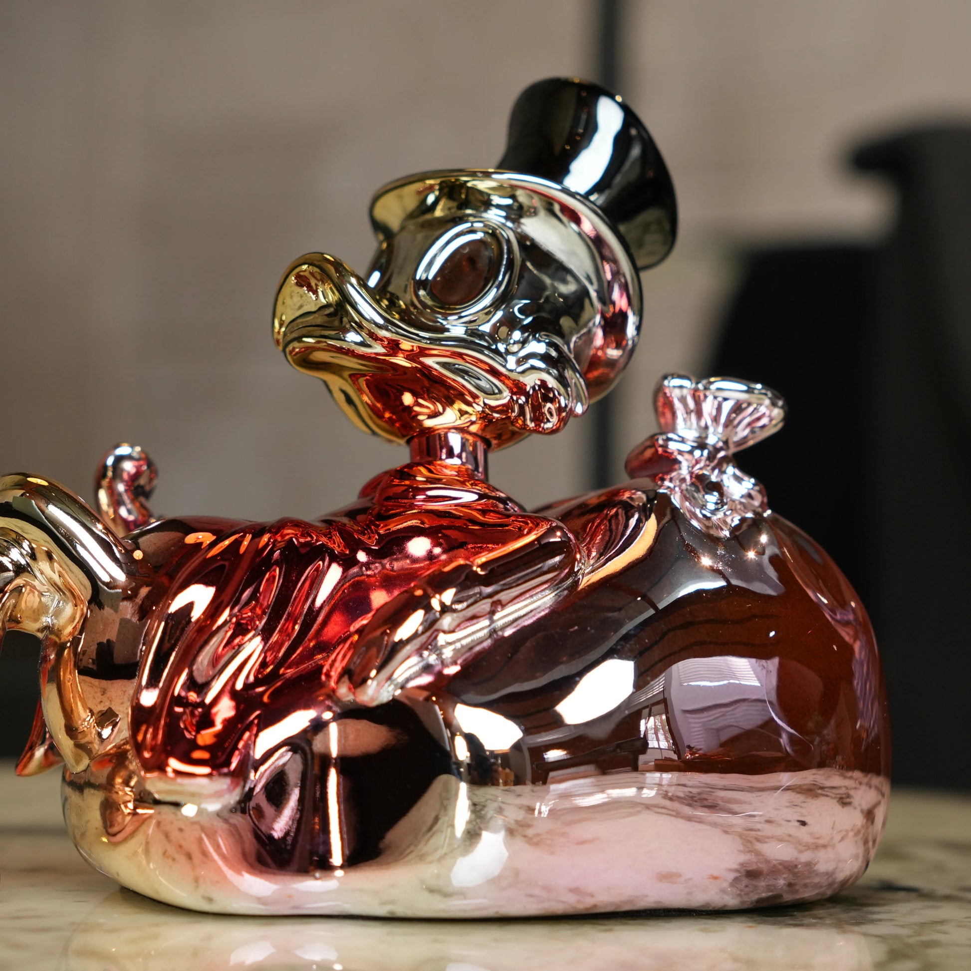 Chrome Money Tycoon gold sculpture