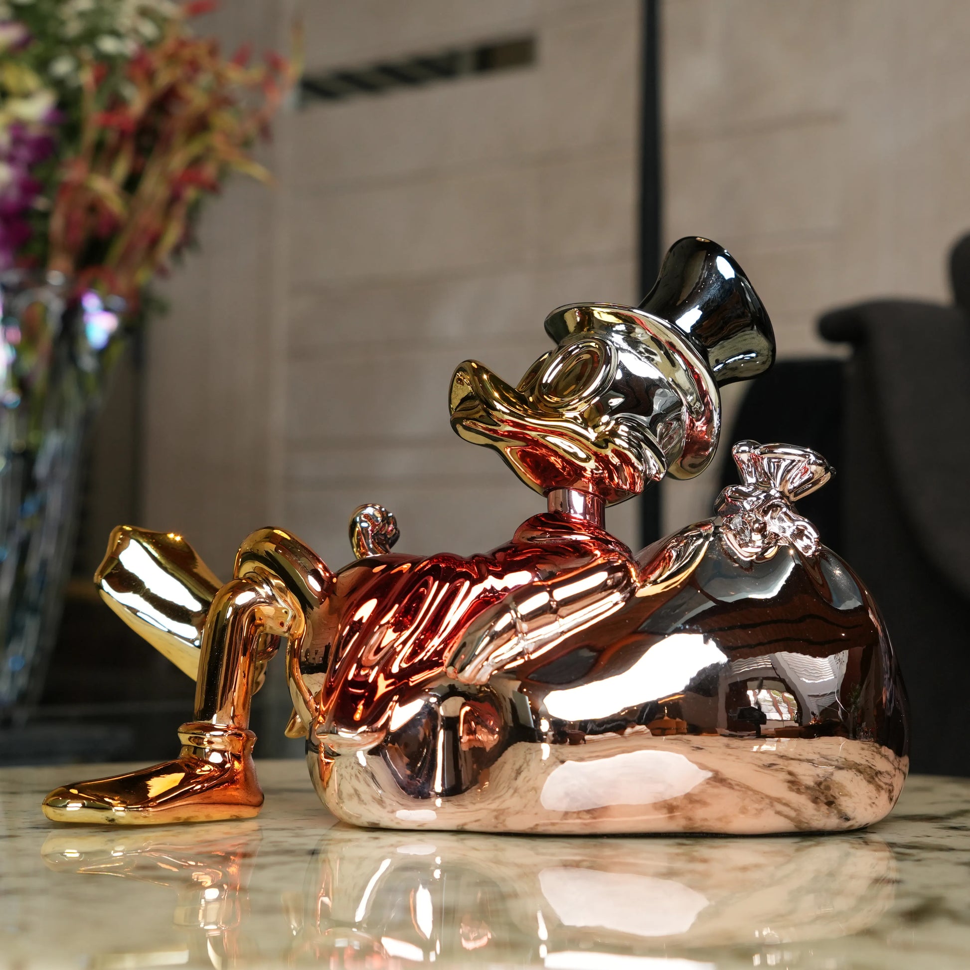 Chrome Money Tycoon gold sculpture