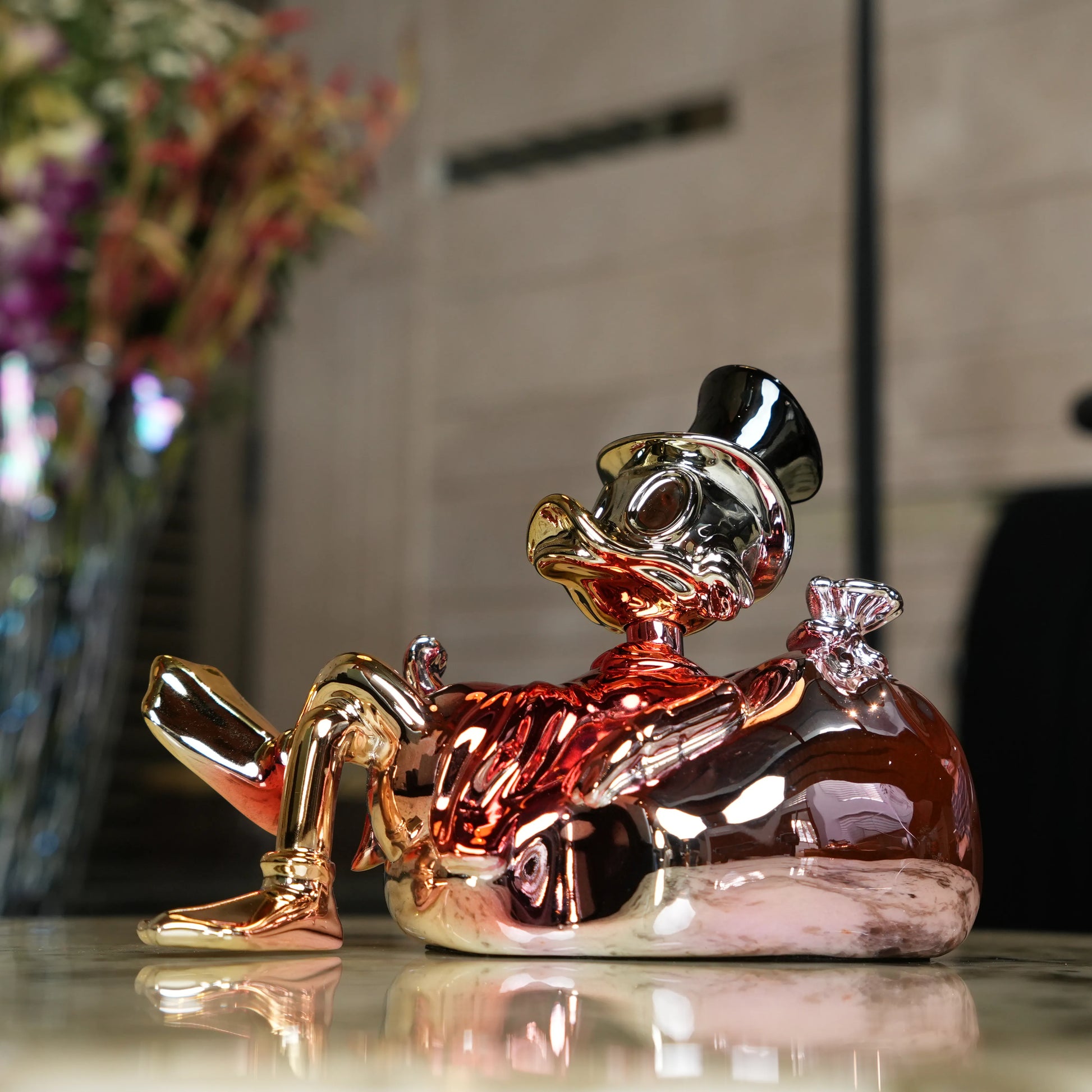 Chrome Money Tycoon gold sculpture