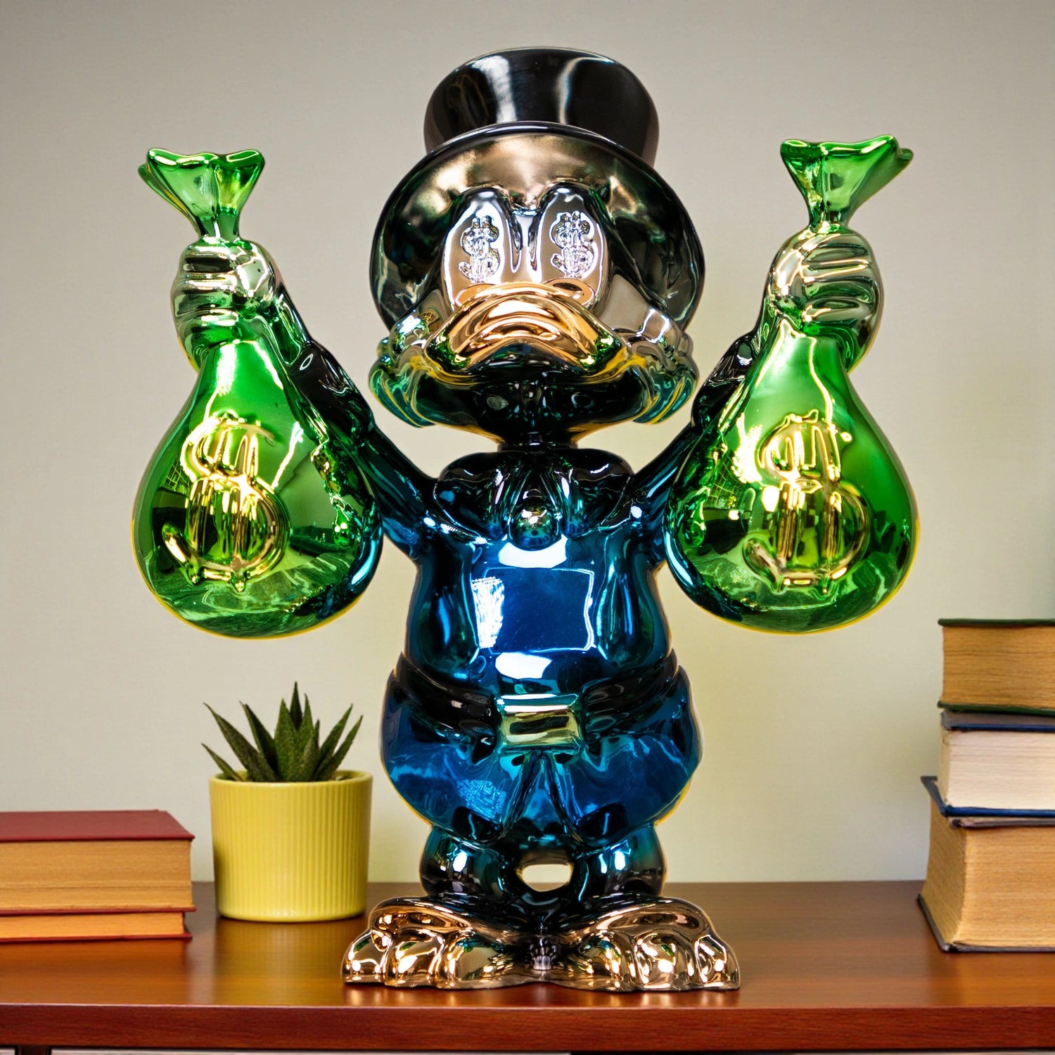 Metallic green and blue duck sculpture holding gold money bags — Money Maestro Sculpture by Ghar Art, handcrafted luxury pop-art collectible for modern decor.