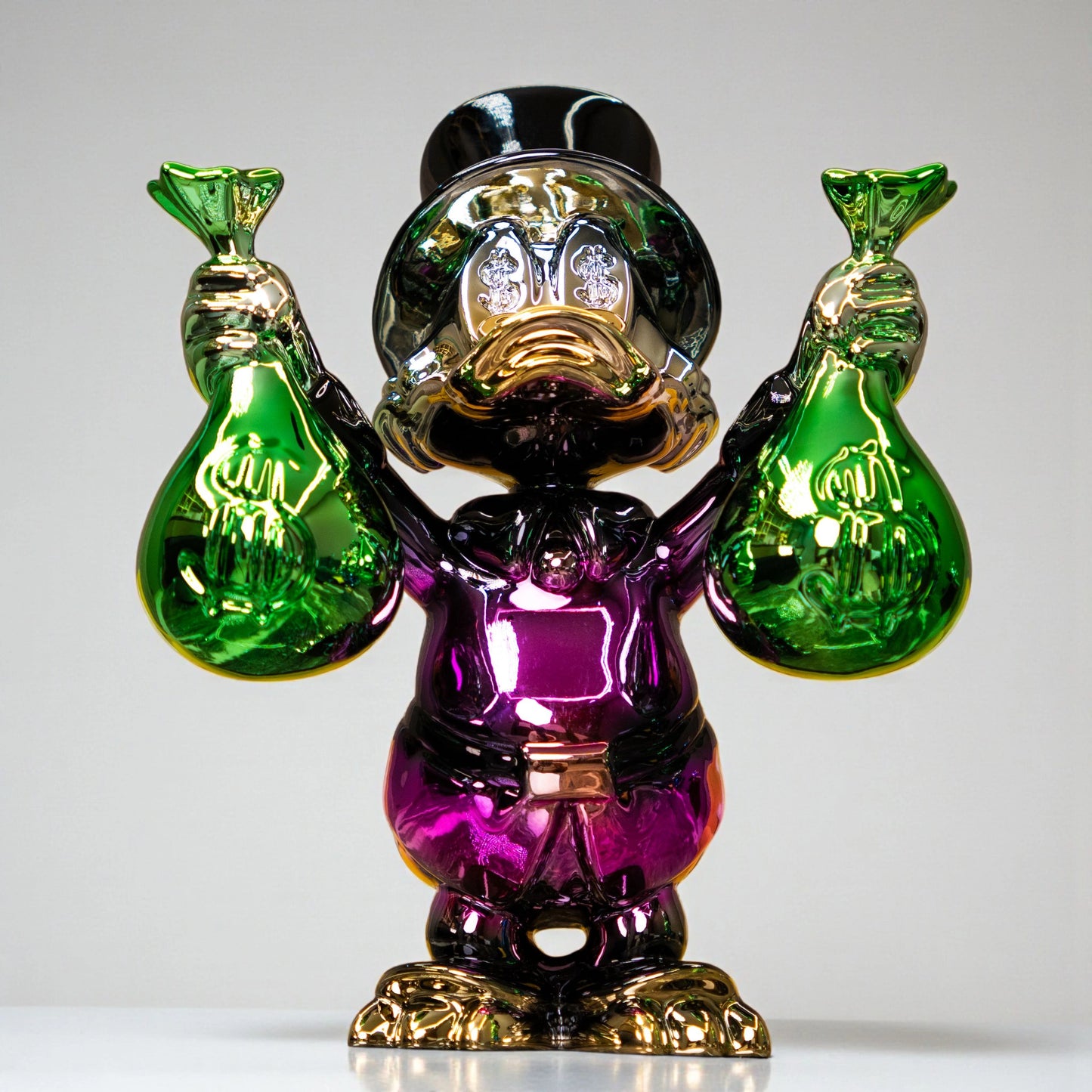 Pink metallic duck sculpture holding emerald money bags — Money Maestro – Pink Edition by Ghar Art, handcrafted luxury pop-art collectible.