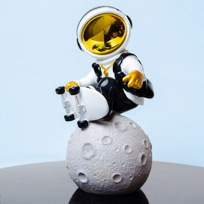 white cosmic skater astronaut figurine sitting on moon with skateboard