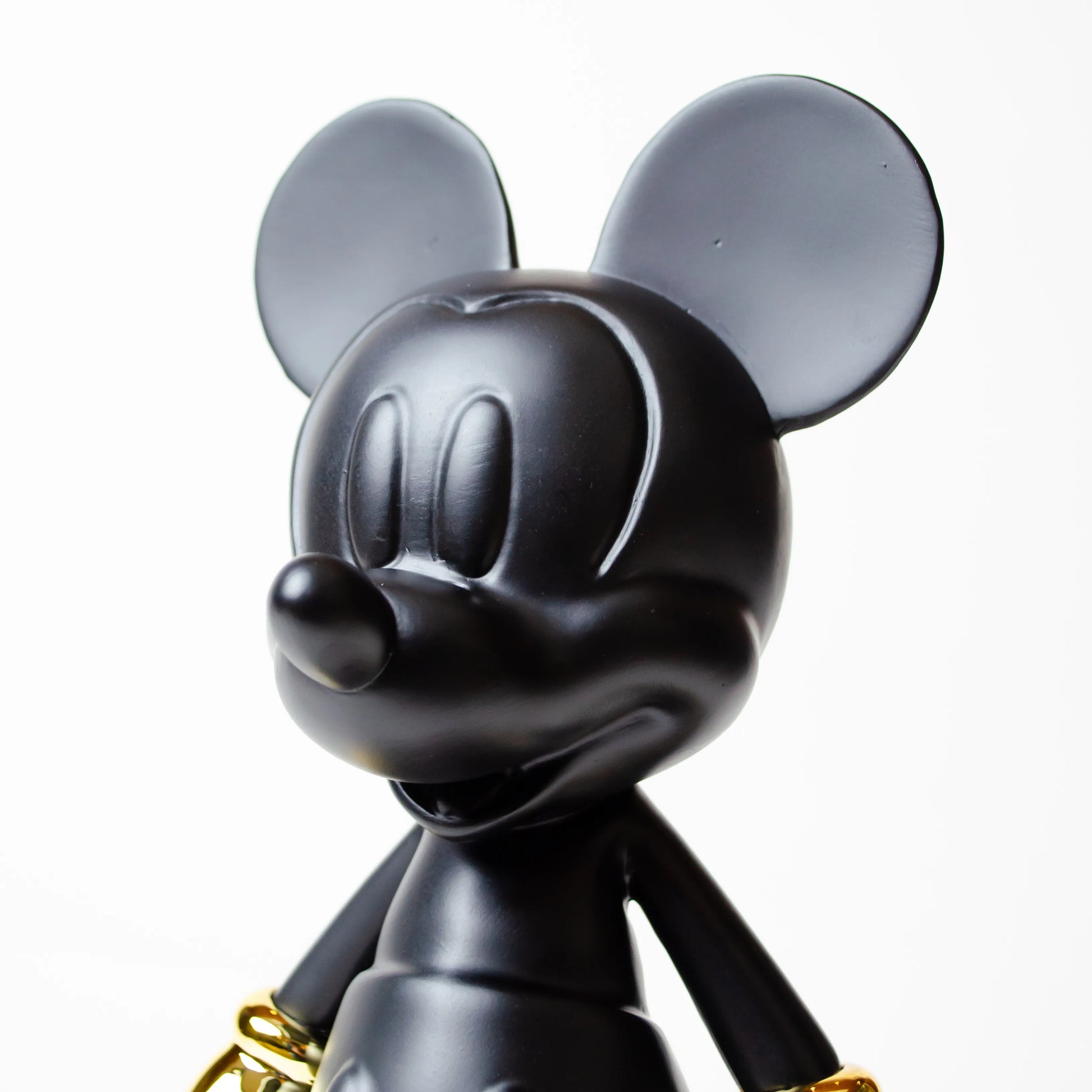 Cyberpunk mascot mini matte black sculpture with gold hands and red visor for modern home decor