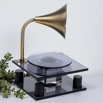 black retro-style acoustic amplifier decor piece with gold funnel top
