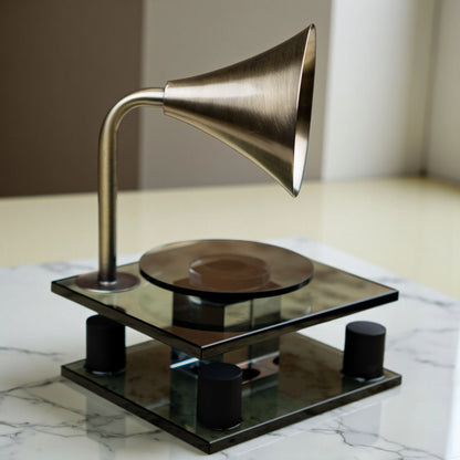black retro-style acoustic amplifier decor piece with gold funnel top