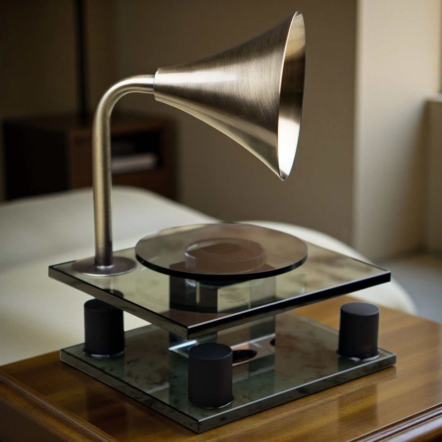 black retro-style acoustic amplifier decor piece with gold funnel top