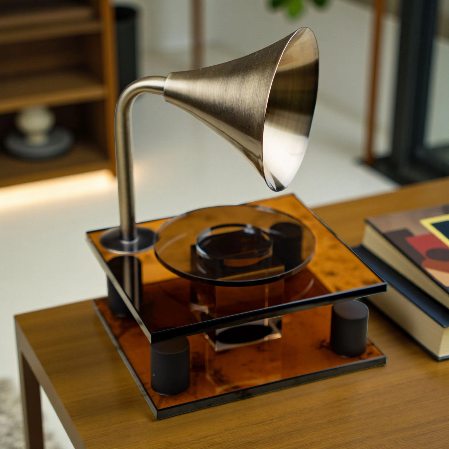 brown retro-style acoustic amplifier decor piece with gold funnel top