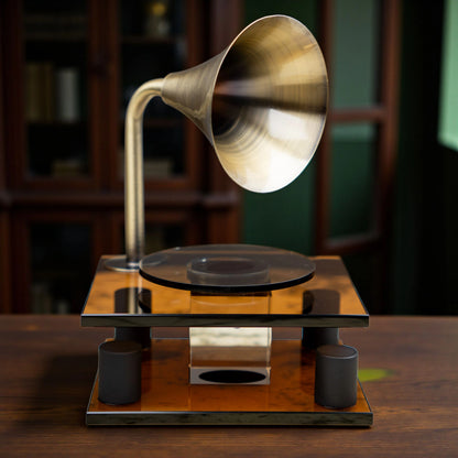 brown retro-style acoustic amplifier decor piece with gold funnel top