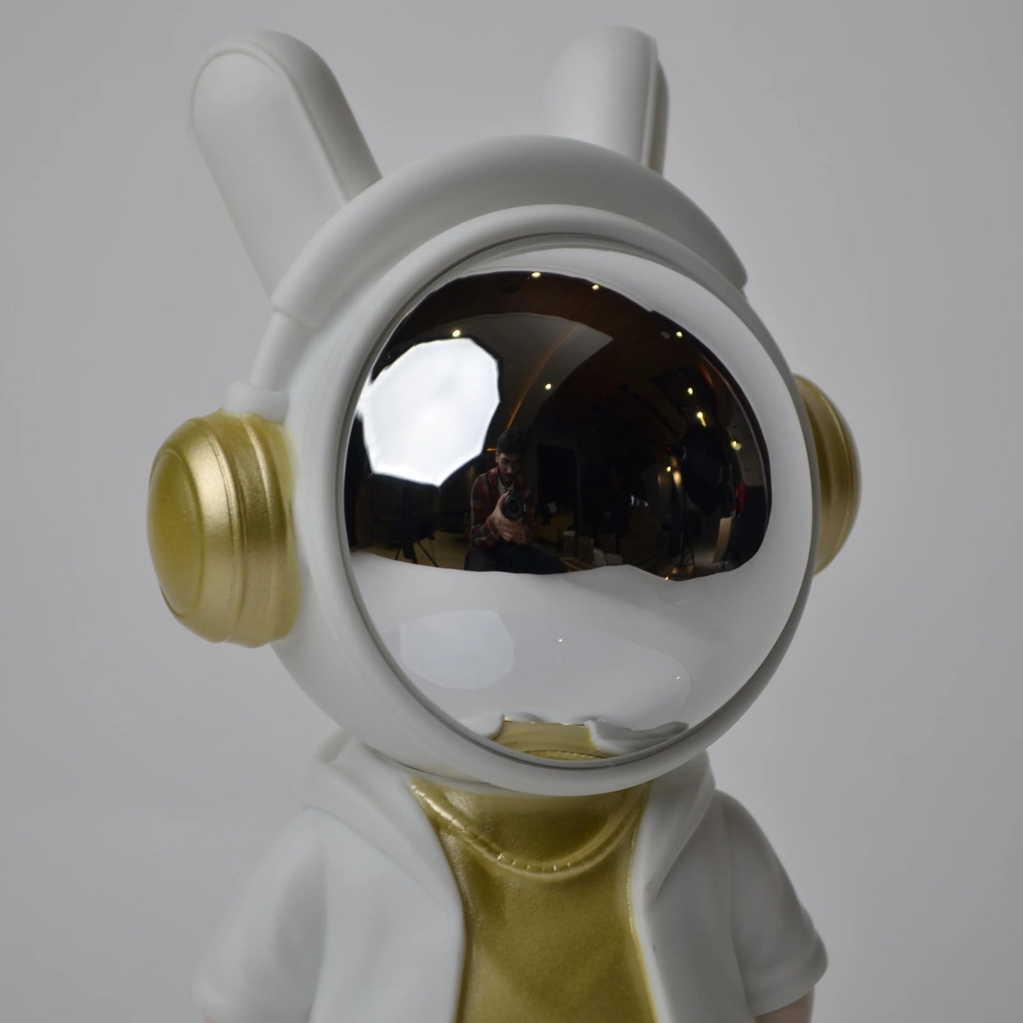 Cosmic Gold Voyager astronaut figurine with gold visor and white outfit