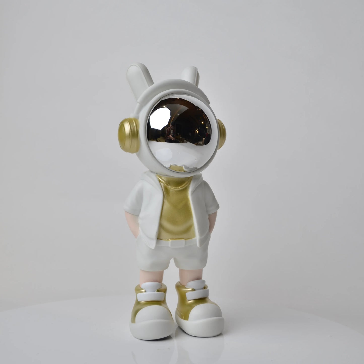 Cosmic Gold Voyager astronaut figurine with gold visor and white outfit