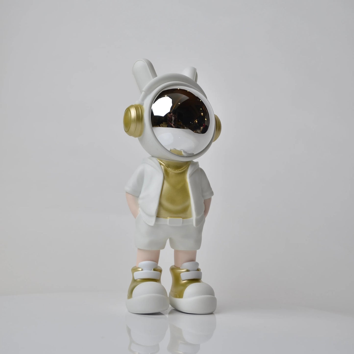 Cosmic Gold Voyager astronaut figurine with gold visor and white outfit