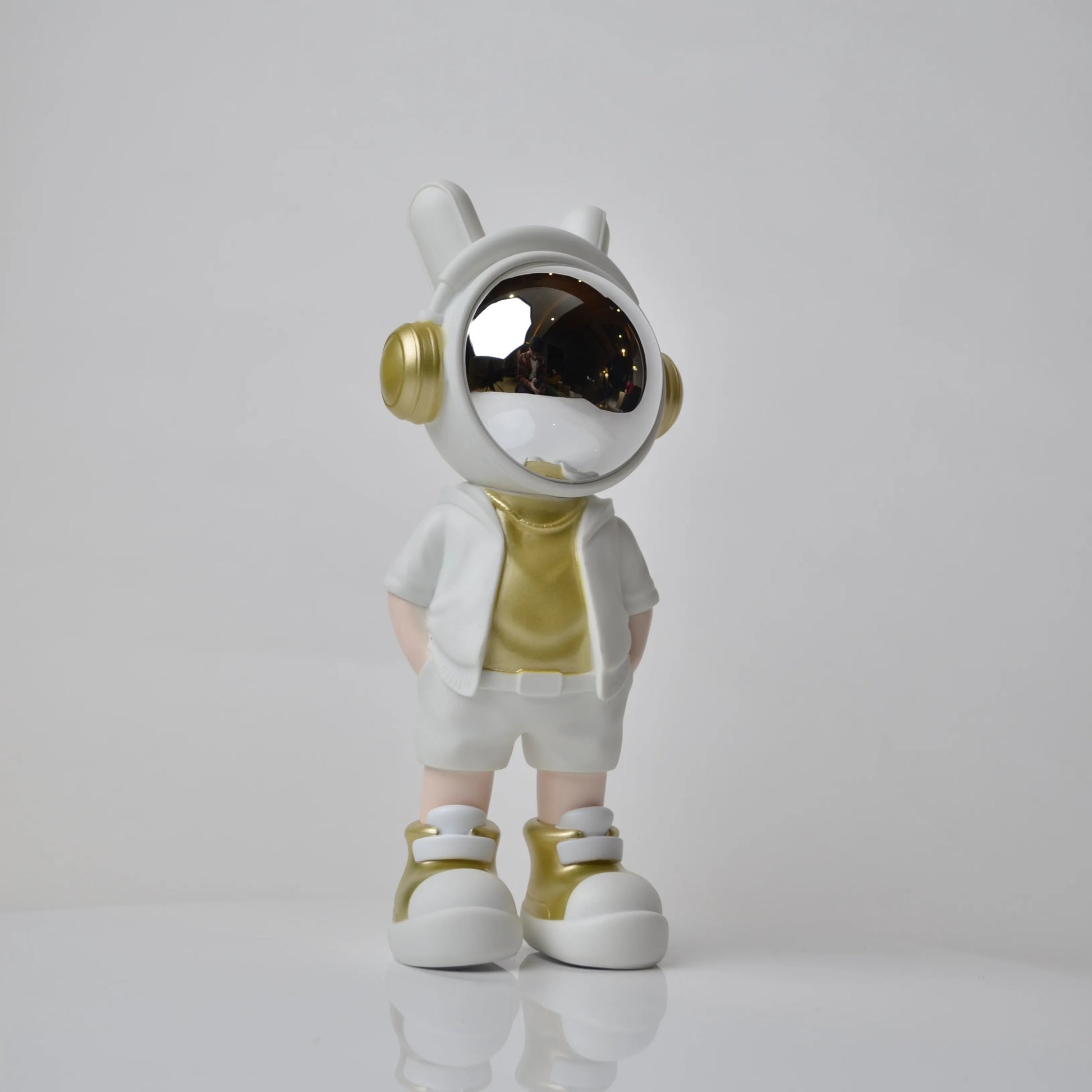 Cosmic Gold Voyager astronaut figurine with gold visor and white outfit